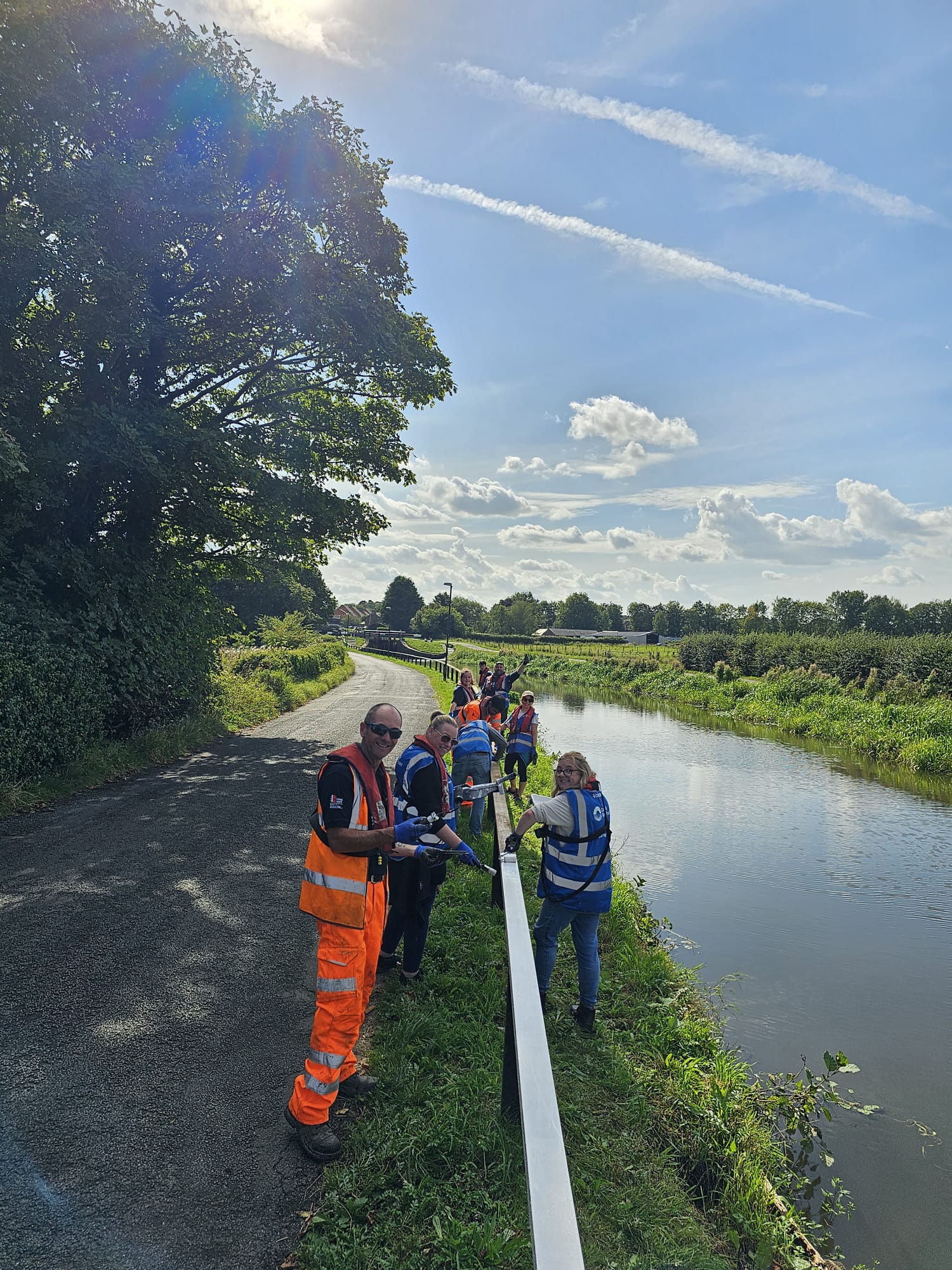 Canal & River Trust in gaining Green Flag status - team building the footpath railing
